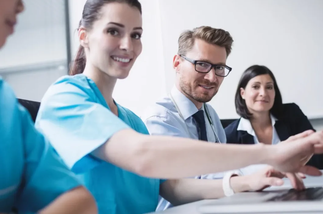 doctors-discussing-laptop-meetin