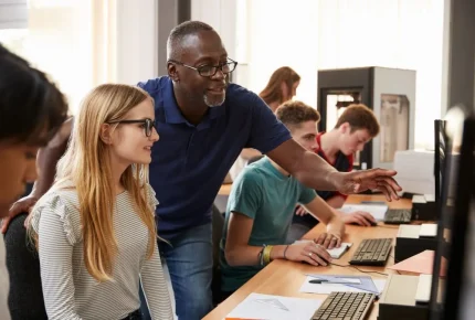 teacher-male-teenagers-computers